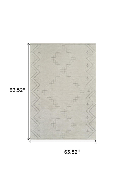 5' X 8' Cream and Beige Abstract Distressed Area Rug