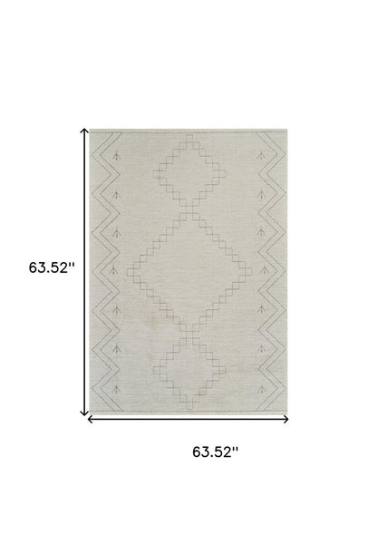 5' X 8' Cream and Beige Abstract Distressed Area Rug