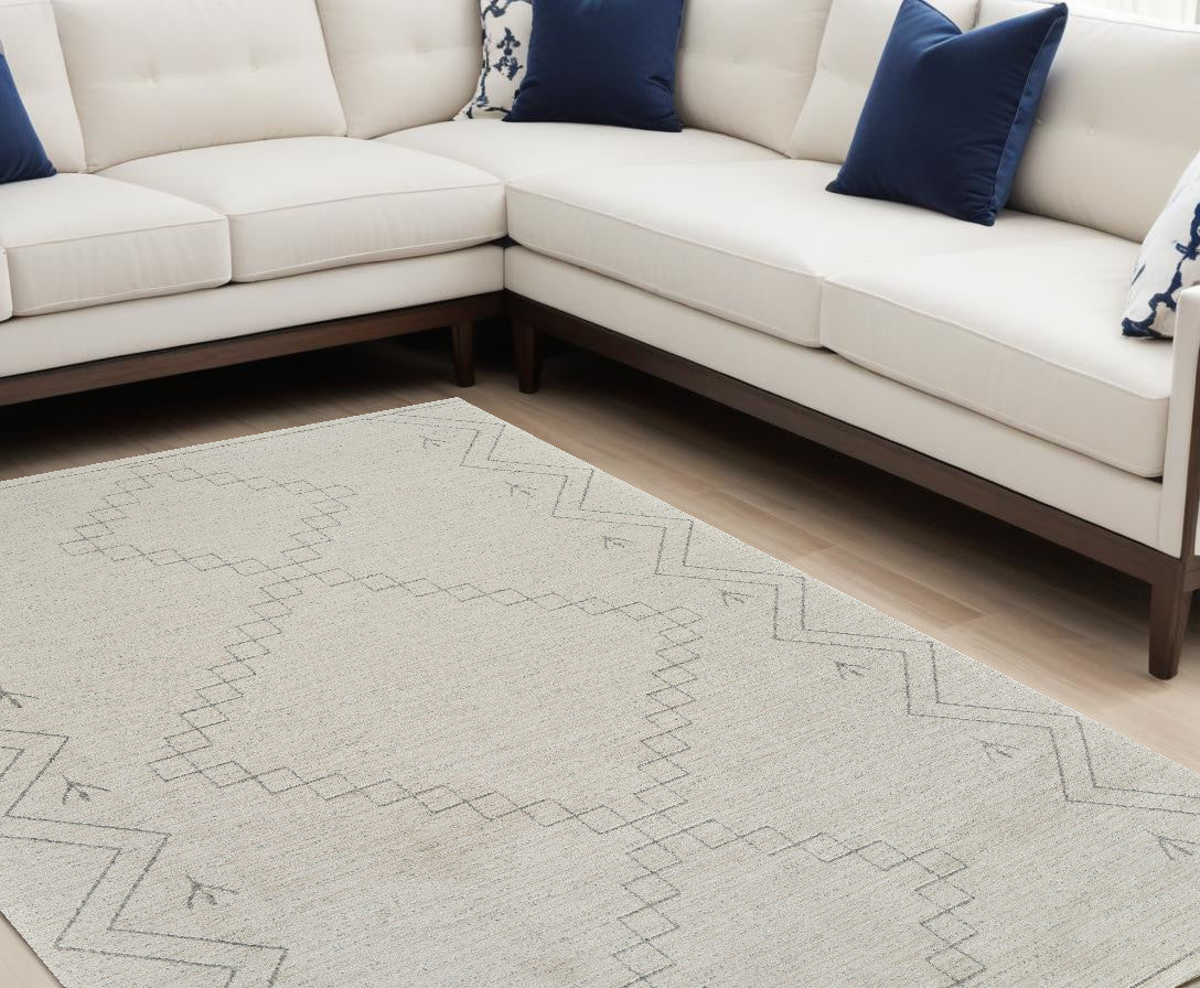 7' X 10' Cream and Beige Abstract Distressed Area Rug