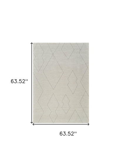 5' X 8' Cream and Beige Abstract Distressed Area Rug