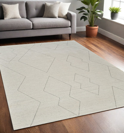 5' X 8' Cream and Beige Abstract Distressed Area Rug