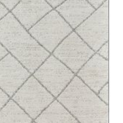 8' Cream and Beige Abstract Distressed Area Rug