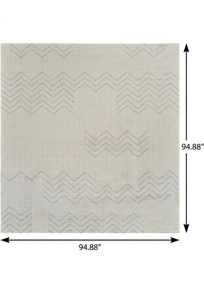 8' X 11' Cream and Beige Abstract Distressed Area Rug