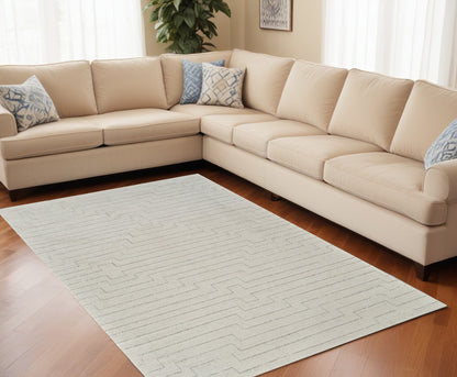 5' X 8' Cream and Beige Abstract Distressed Area Rug