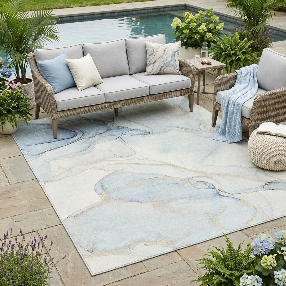 5' X 8' Beige and Blue Abstract Washable Non Skid Indoor Outdoor Area Rug
