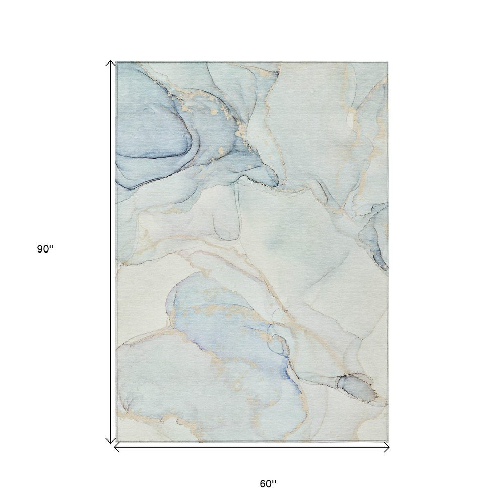 5' X 8' Beige and Blue Abstract Washable Non Skid Indoor Outdoor Area Rug