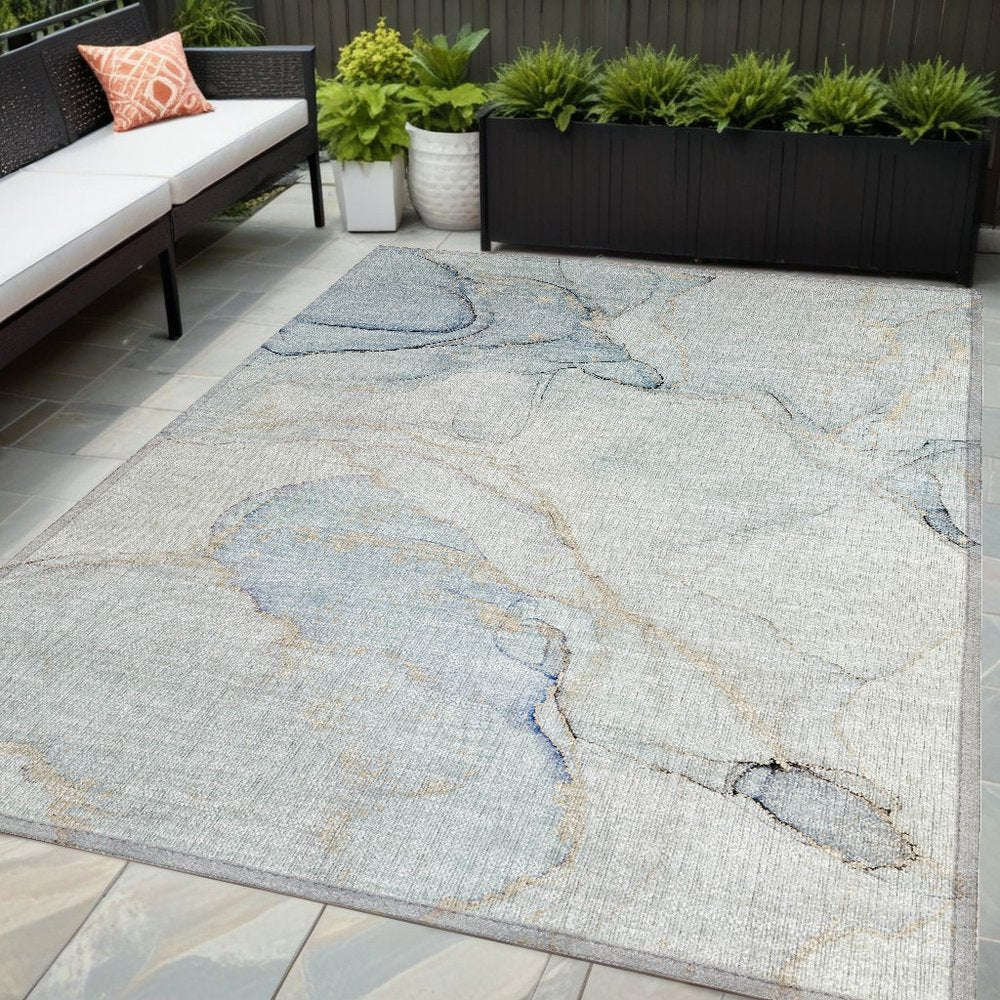5' X 8' Beige and Blue Abstract Washable Non Skid Indoor Outdoor Area Rug