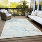 5' X 8' Beige and Blue Abstract Washable Non Skid Indoor Outdoor Area Rug
