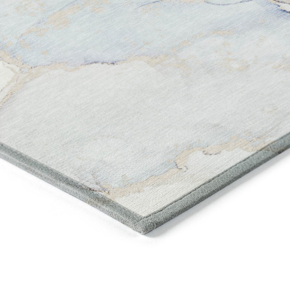 5' X 8' Beige and Blue Abstract Washable Non Skid Indoor Outdoor Area Rug