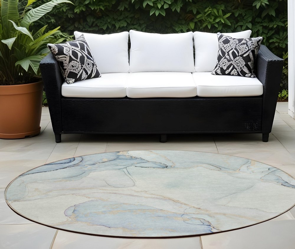 5' X 8' Beige and Blue Abstract Washable Non Skid Indoor Outdoor Area Rug