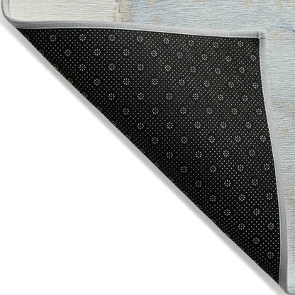 5' X 8' Beige and Blue Abstract Washable Non Skid Indoor Outdoor Area Rug
