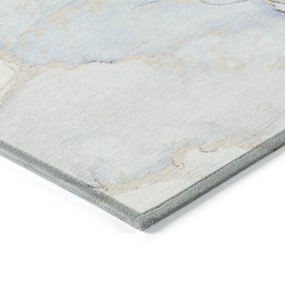 5' X 8' Beige and Blue Abstract Washable Non Skid Indoor Outdoor Area Rug