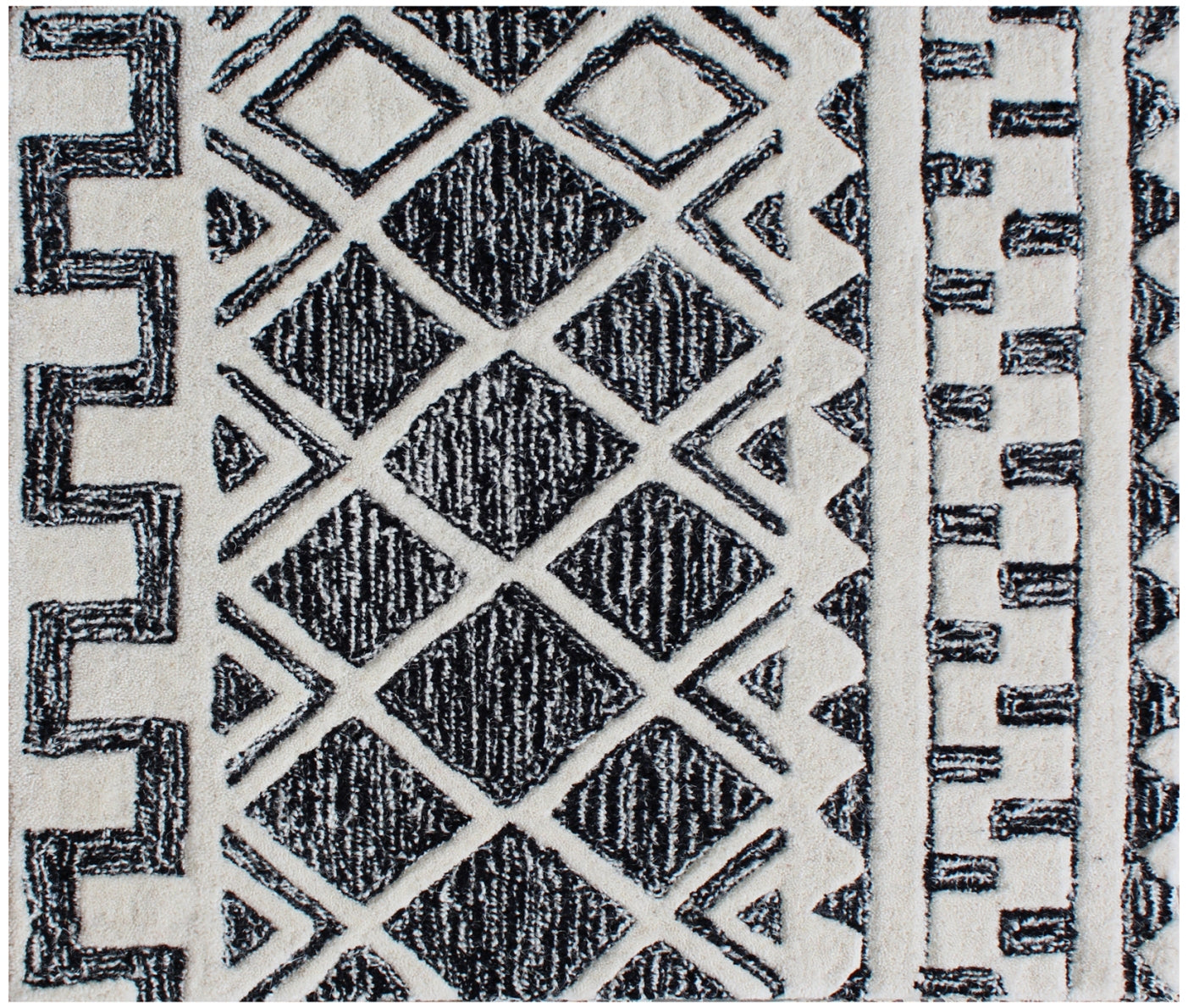 5' X 8' Black and Ivory Wool Abstract Geometric Hand Tufted Non Skid Area Rug