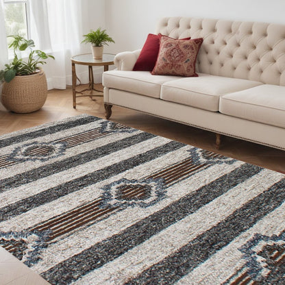 5' X 8' Beige Abstract Geometric Hand Tufted Non Skid Area Rug