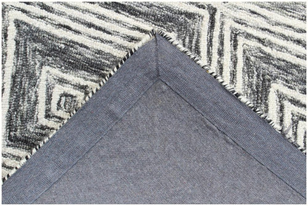 8' X 10' Black and Ivory Wool Abstract Geometric Hand Tufted Non Skid Area Rug
