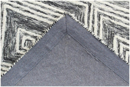 8' X 10' Black and Ivory Wool Abstract Geometric Hand Tufted Non Skid Area Rug