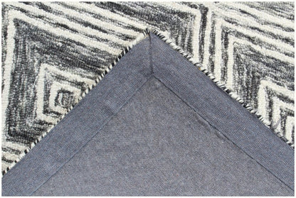 8' X 10' Black and Ivory Wool Abstract Geometric Hand Tufted Non Skid Area Rug