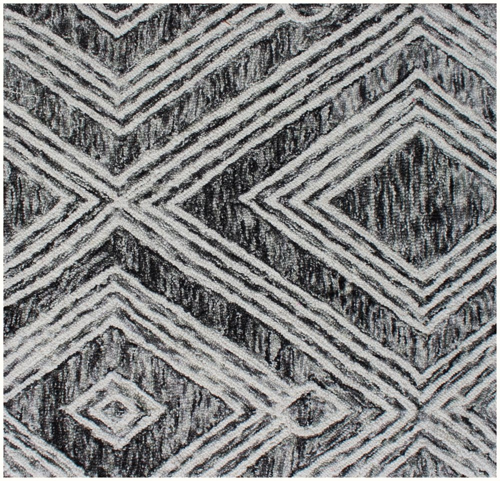 8' X 10' Black and Ivory Wool Abstract Geometric Hand Tufted Non Skid Area Rug
