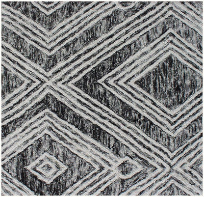 8' X 10' Black and Ivory Wool Abstract Geometric Hand Tufted Non Skid Area Rug