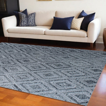 8' X 10' Black and Ivory Wool Abstract Geometric Hand Tufted Non Skid Area Rug