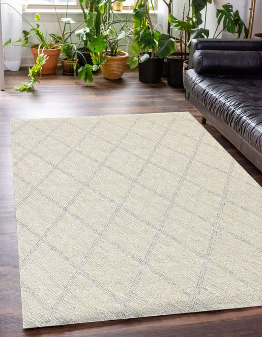5' X 8' Ivory Wool Abstract Geometric Hand Tufted Non Skid Area Rug