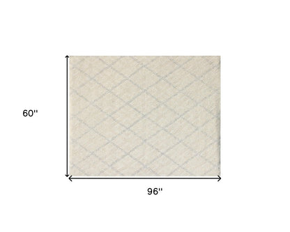 5' X 8' Ivory Wool Abstract Geometric Hand Tufted Non Skid Area Rug