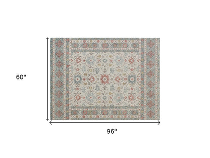 5' X 8' Ivory and Blue Wool Oriental Hand Tufted Non Skid Area Rug