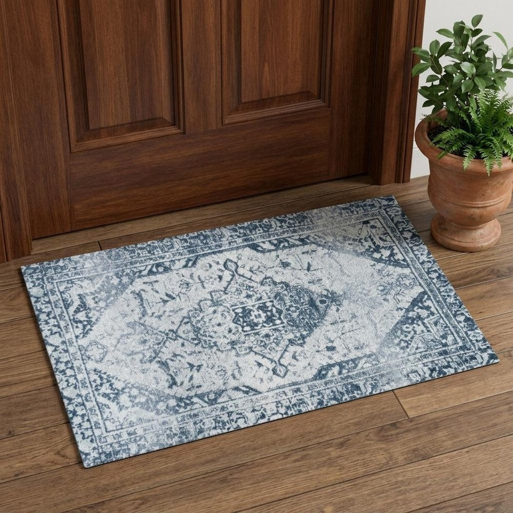 2' X 3' Dark Blue Gray And Ivory Oriental Distressed Washable Area Rug With UV Protection