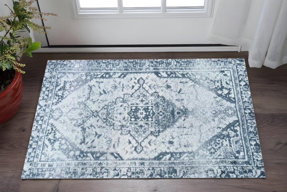 2' X 3' Dark Blue Gray And Ivory Oriental Distressed Washable Area Rug With UV Protection