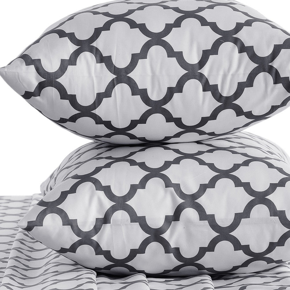 Four Piece White and Charcoal Quatrefoil Microfiber California King Sheet Set