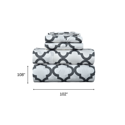 Four Piece White and Charcoal Quatrefoil Microfiber California King Sheet Set