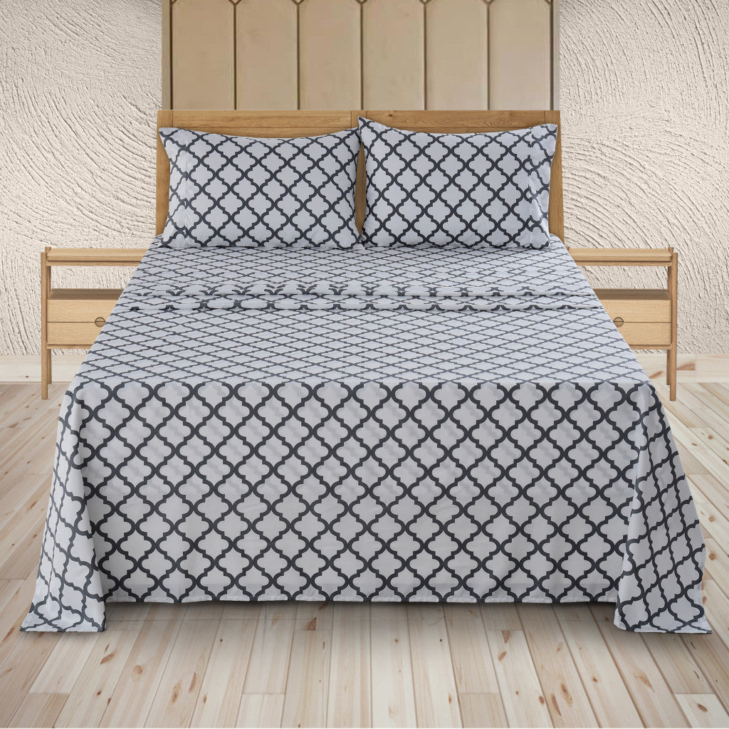 Four Piece White and Charcoal Quatrefoil Microfiber California King Sheet Set