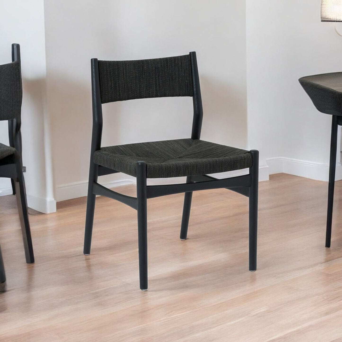 Five Piece Brown and Black Round Dining Set with Four Chairs