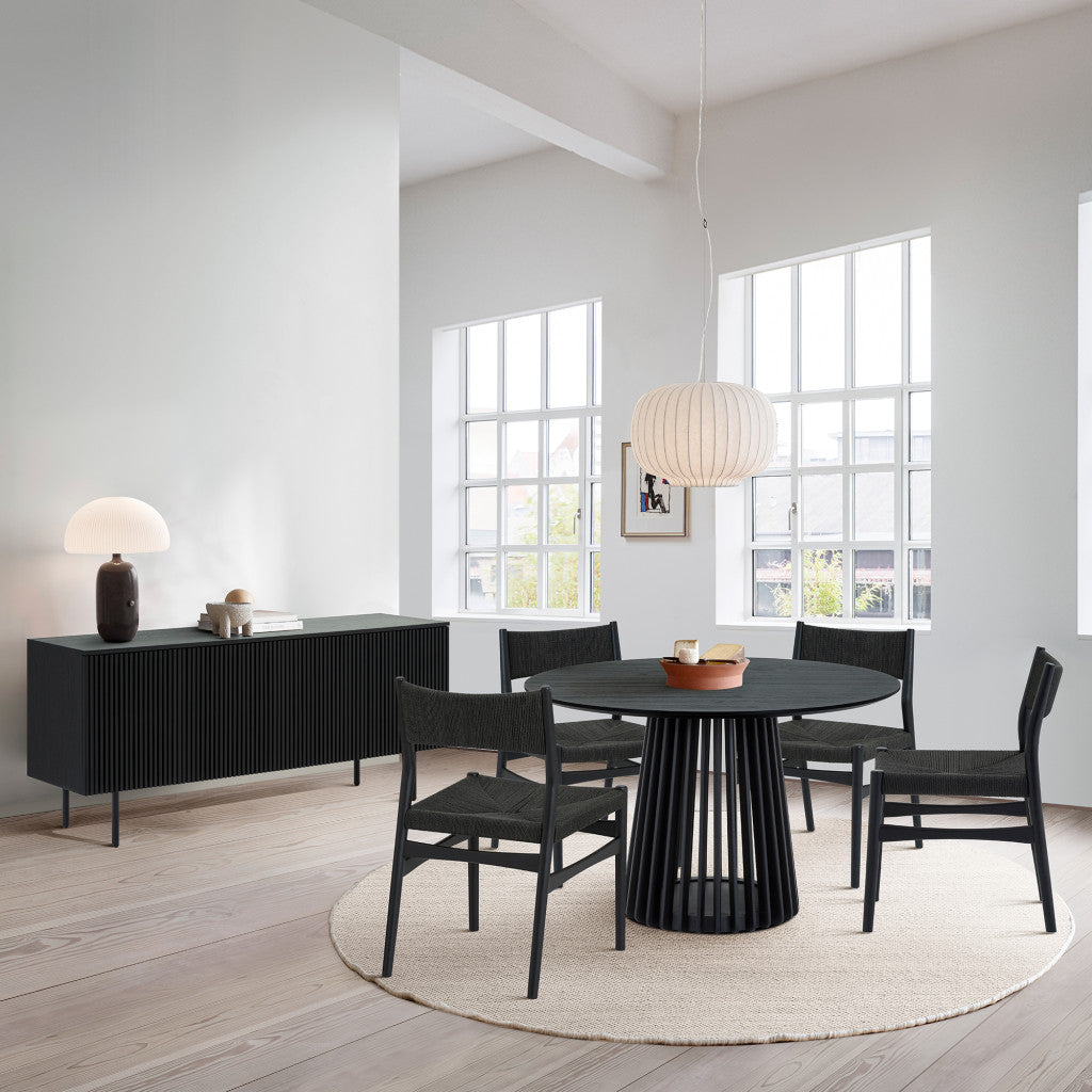 Six Piece Black Round Dining Set with Four Chairs and Sideboard