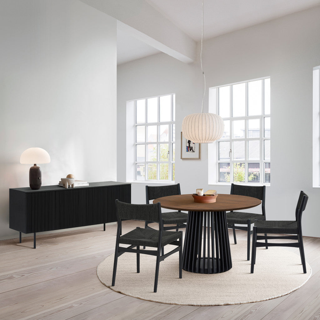 Six Piece Brown and Black Round Dining Set with Four Chairs and Sideboard